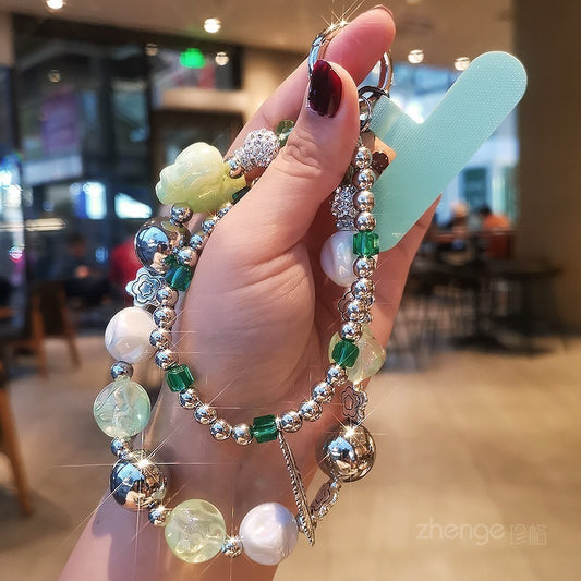 Enhance your phone with a fun accessory, making it the perfect gift idea for teachers, sisters, and friends! Add some personality and flare to your phone with this double-chain short cell phone chain. \