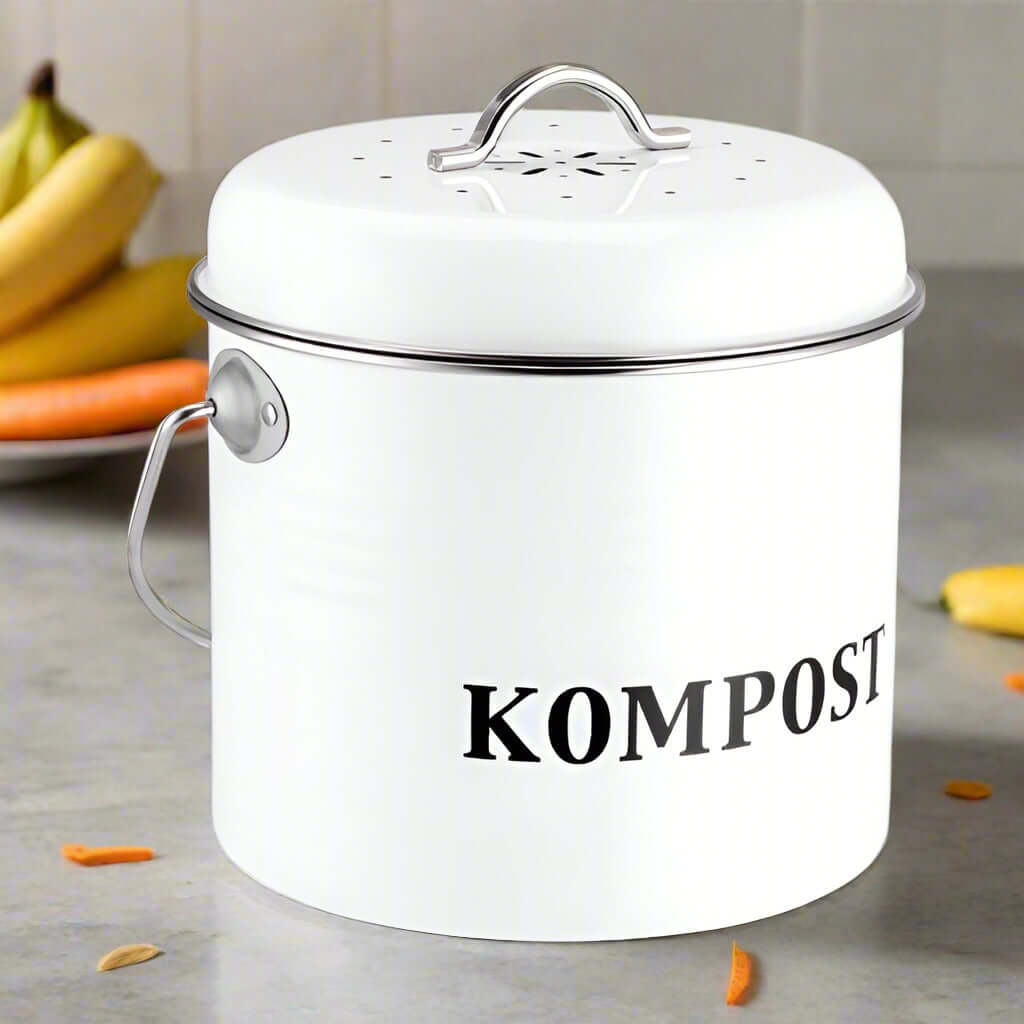 White kitchen compost bin with lid, labeled 'KOMPOST', perfect for eco-friendly waste disposal.