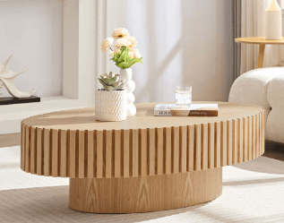 Modern oval drum coffee table with a unique ribbed design, ideal for decorative display and use in any living room.