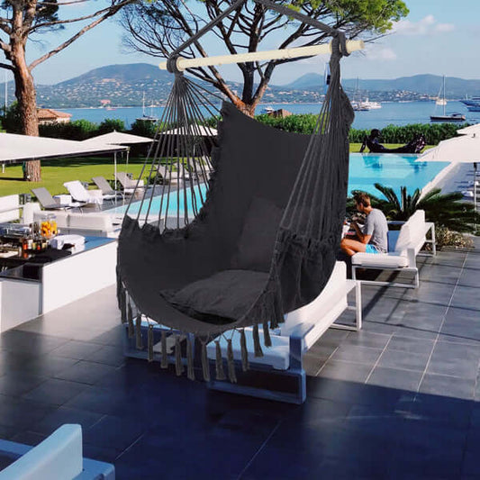 Elevate your outdoor experience with our Gray Fringe Hanging Chair. Lightweight, portable, and easy to set up for ultimate comfort.