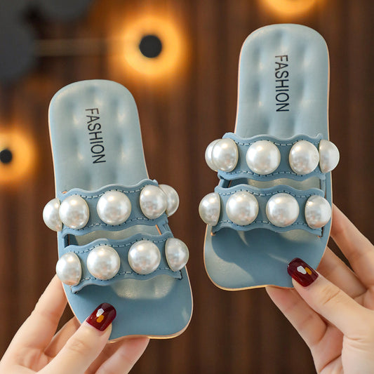 Girls' Pearly Slip-On Sandals in blue with pearl accents, perfect for stylish comfort on any occasion.