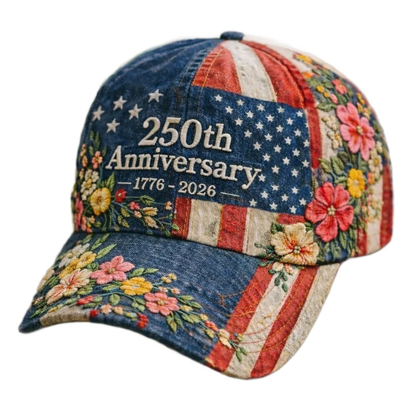 Cap with floral patterns and '250th Anniversary 1776-2026' text on a white background