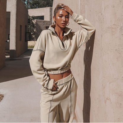 Active women's sweatshirt and pant set in cozy beige design, perfect for casual outings and stylish comfort.