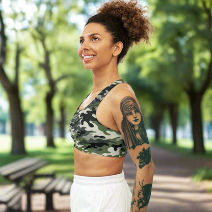 A camouflage sports bra designed for comfort and style. Perfect for the gym, training, or everyday wear, this medium support sports bra is made from a moisture-wicking, stretchy fabric that moves with you. Soft to the touch and seamless for added comfort.