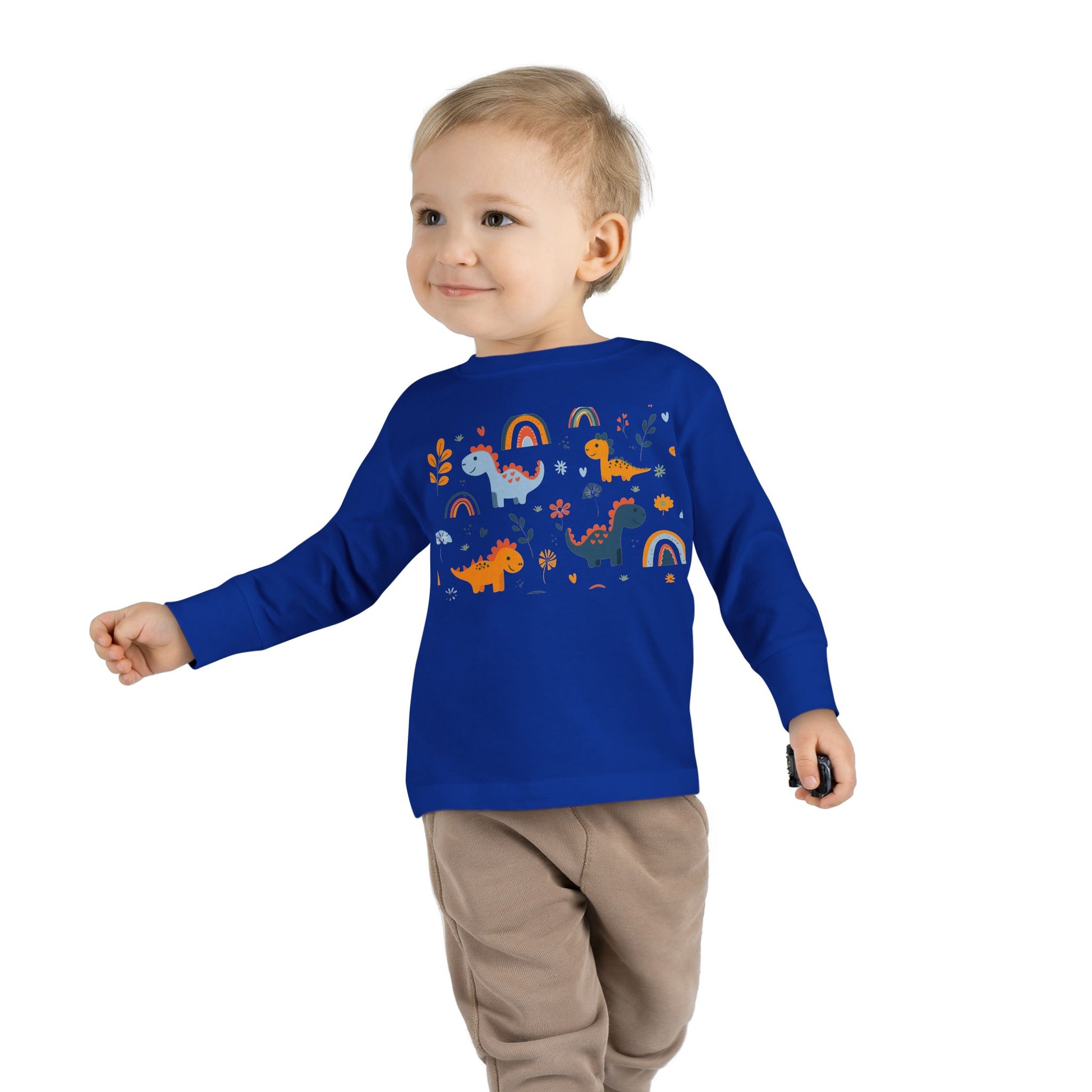 This adorable Dinosaurs, Flowers & Rainbows Toddler Tee is perfect for little ones who love vibrant and fun designs. Made with 100% combed, ring-spun cotton, this light fabric tee is comfortable and durable for all-day wear. With a toddler unisex fit, rib