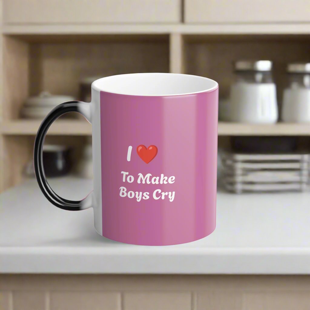 Fun and quirky color morphing mug with the saying "I Love to make boys cry", perfect for those with a sense of humor. This mug is heat-sensitive and reveals the design when filled with a hot drink, adding a magical touch to your morning routine. Ideal for