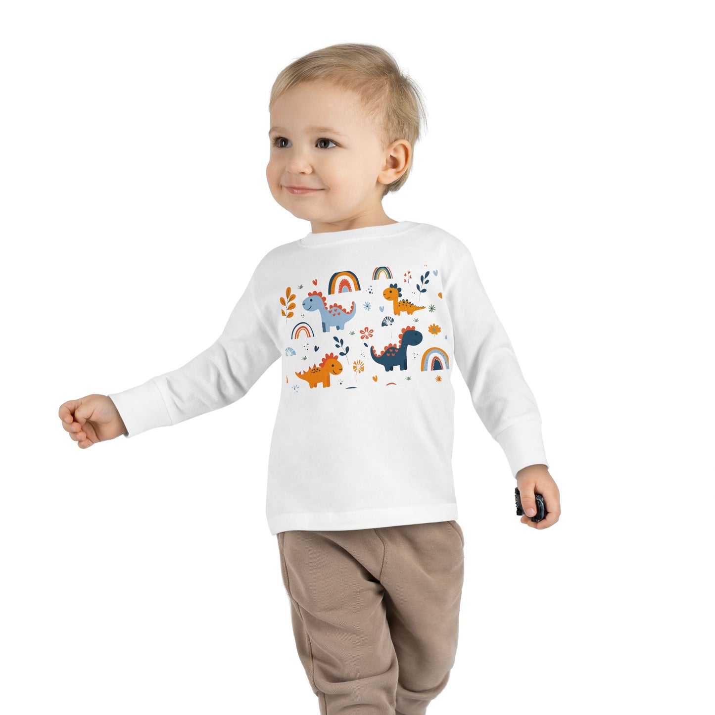 This adorable Dinosaurs, Flowers & Rainbows Toddler Tee is perfect for little ones who love vibrant and fun designs. Made with 100% combed, ring-spun cotton, this light fabric tee is comfortable and durable for all-day wear. With a toddler unisex fit, rib