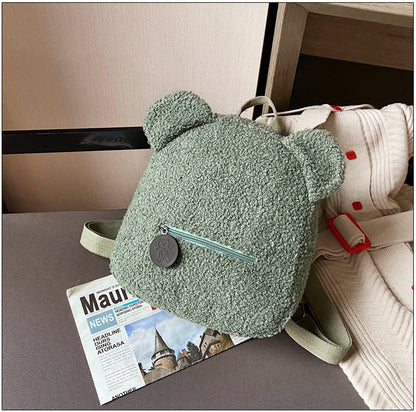 Get ready to snuggle up with this adorable Mini Backpack! Featuring a fluffy lamb design and a single strap, this cozy bag is perfect for fall and winter. Don't miss out on adding this must-have one-shoulder messenger bag to your collection! For girls & f