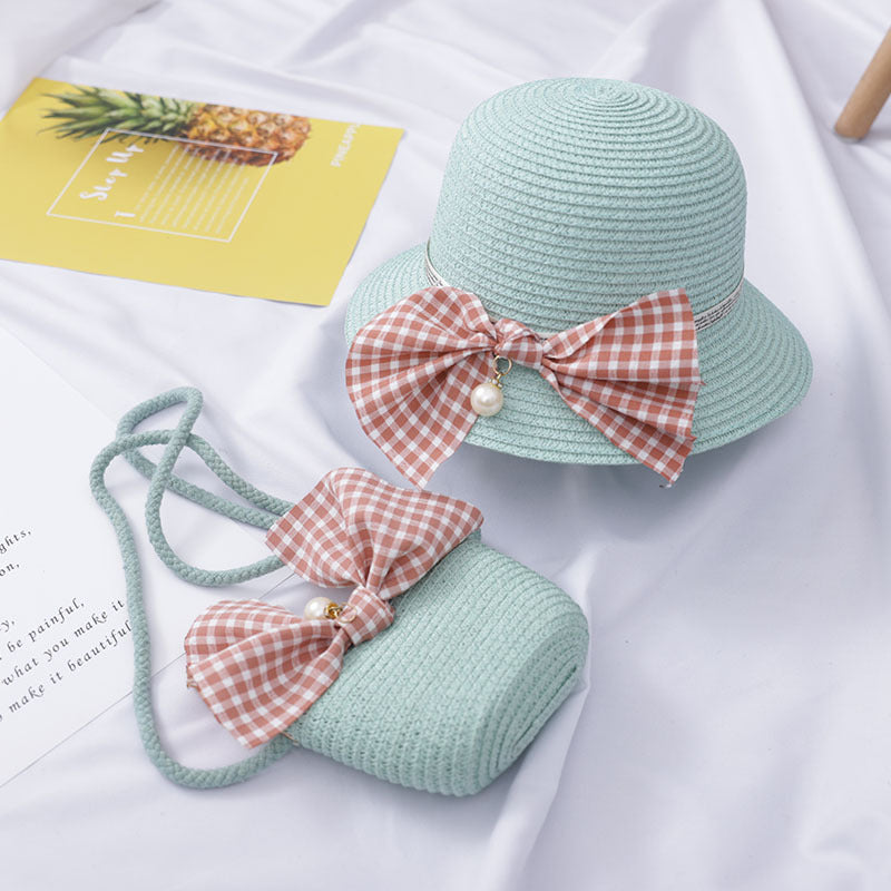 Dress to impress with this absolutely darling straw hat and purse set, featuring a charming bow and a pearly touch! Perfect for a day out with the 'rents or playtime dress-up. You'll never run out of occasions to show off your stylish side! Size Applicabl