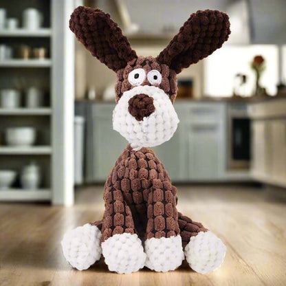 Squeaky Corduroy Chew Toys For Dogs featuring a cute brown dog design in a cozy kitchen setting.
