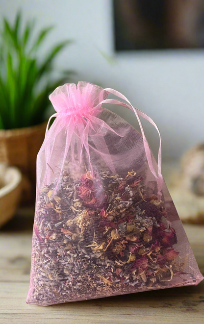 Add a touch of luxury to your home with our Dried Flower Sachet. Perfect for the powder room, drawers, or guest room, these sachets offer a delicate scent of lavender, roses, chamomile, calendula, hibiscus, and orange peel. Transform any space into a sere