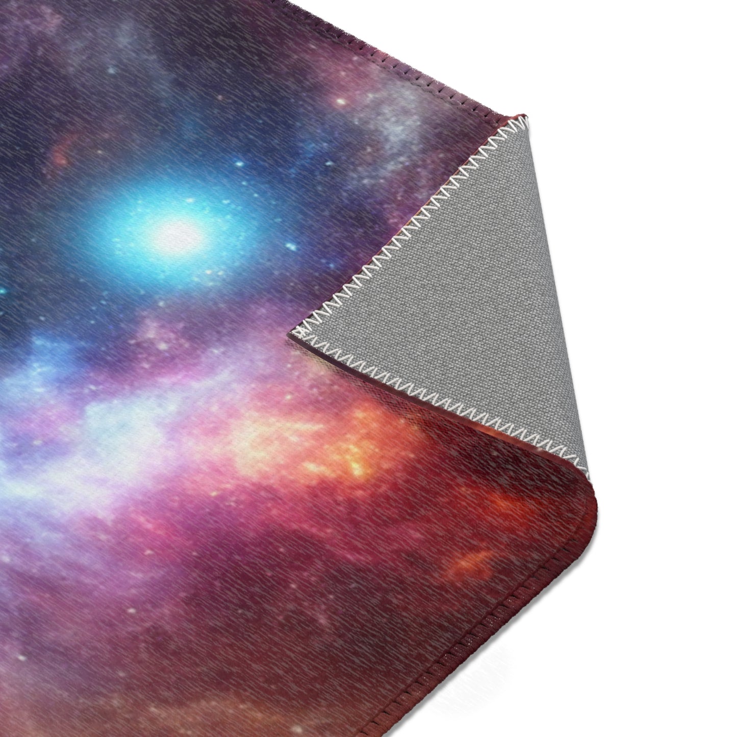 Bring the beauty of the night sky into your home with this Vast Galaxy Area Rug. Perfect for astronomy enthusiasts and stargazers, this rug adds a mystical and dreamy vibe to any room, indoor or out. Ideal for decorating a bedroom, living room, study or o