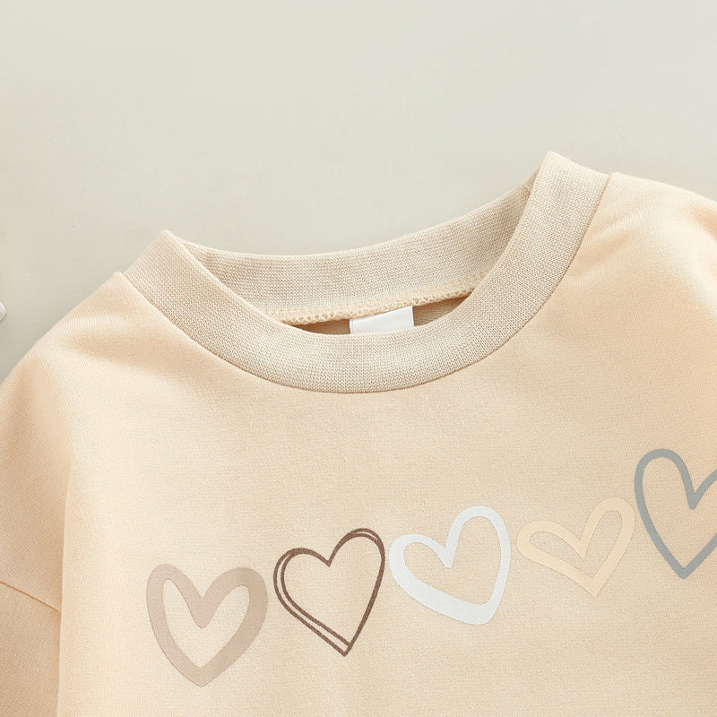 Get ready to fall in love with this cute Children's Love Embroidered One-piece Long Sleeve Romper! It's perfect for autumn days, whether your little one is indoors or outdoors. Made of soft cotton, it's perfect for any occasion - it's simply adorable! Acc