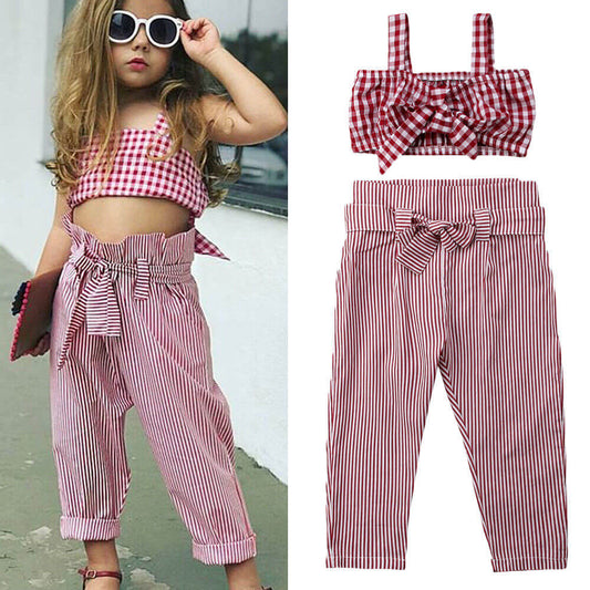 Girl's plaid high waist pants and crop top set in red and white, perfect for stylish casual wear.