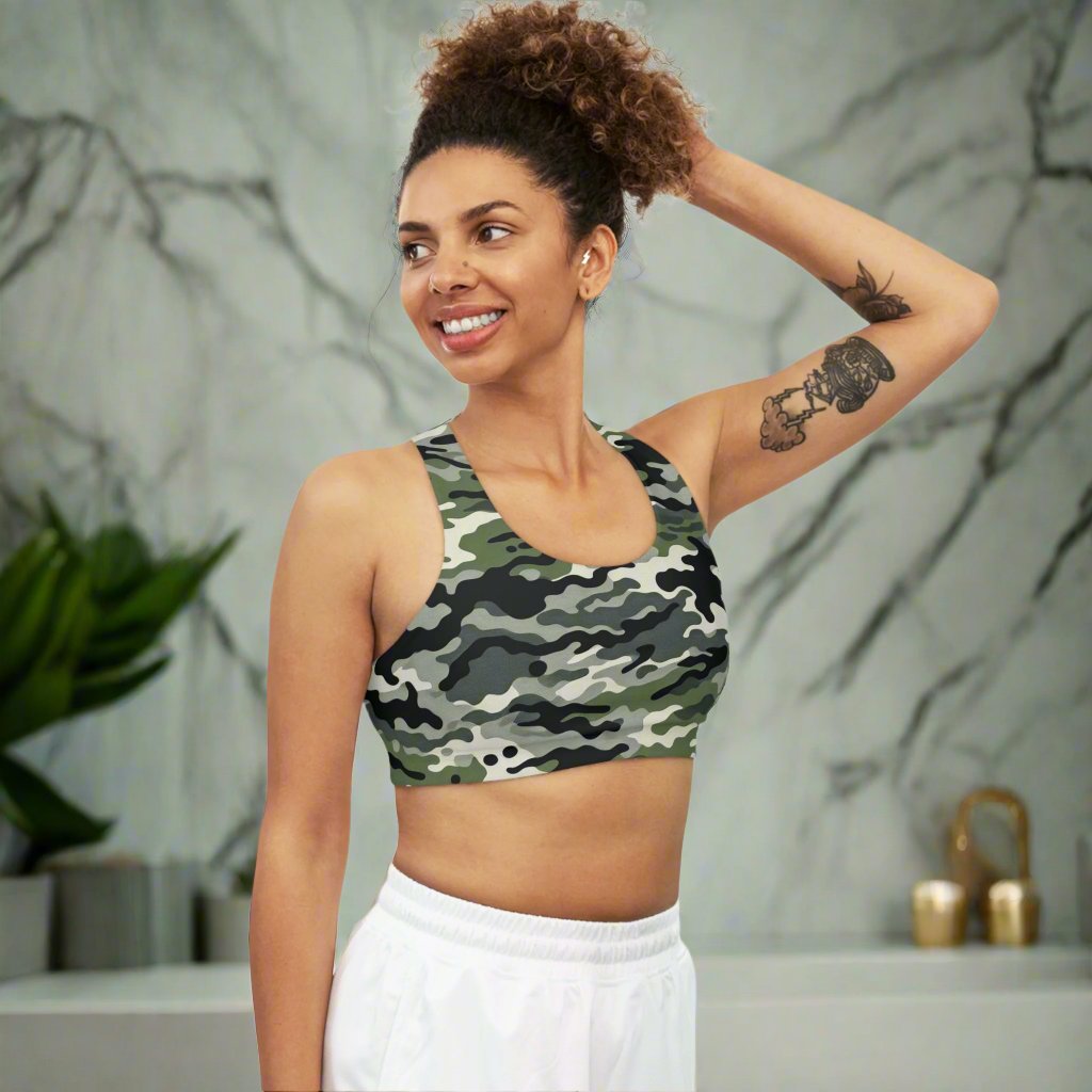 A camouflage sports bra designed for comfort and style. Perfect for the gym, training, or everyday wear, this medium support sports bra is made from a moisture-wicking, stretchy fabric that moves with you. Soft to the touch and seamless for added comfort.