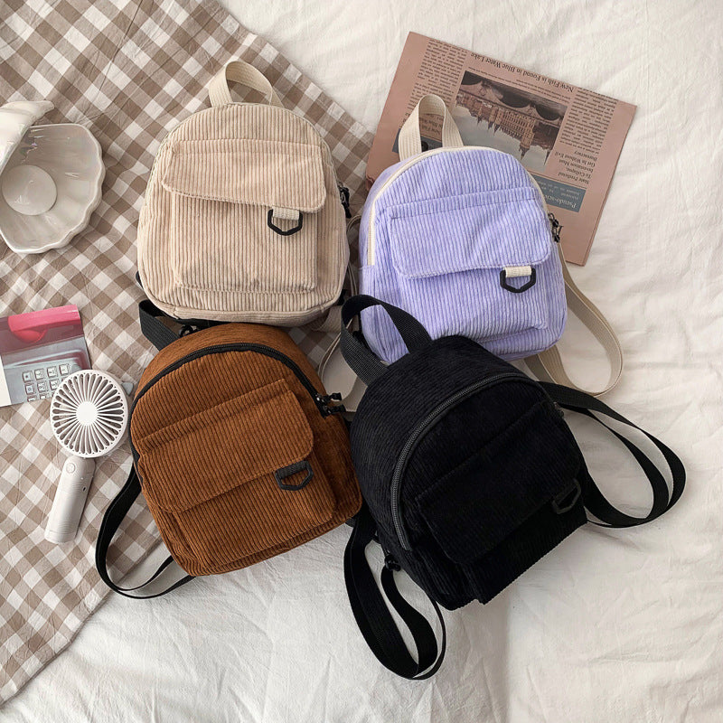 As a passionate believer in our product's value, I highly recommend this backpack for any occasion, whether it be for back to school or everyday use. The cute corduroy design adds a touch of quirkiness to your style, making you stand out with enthusiasm a