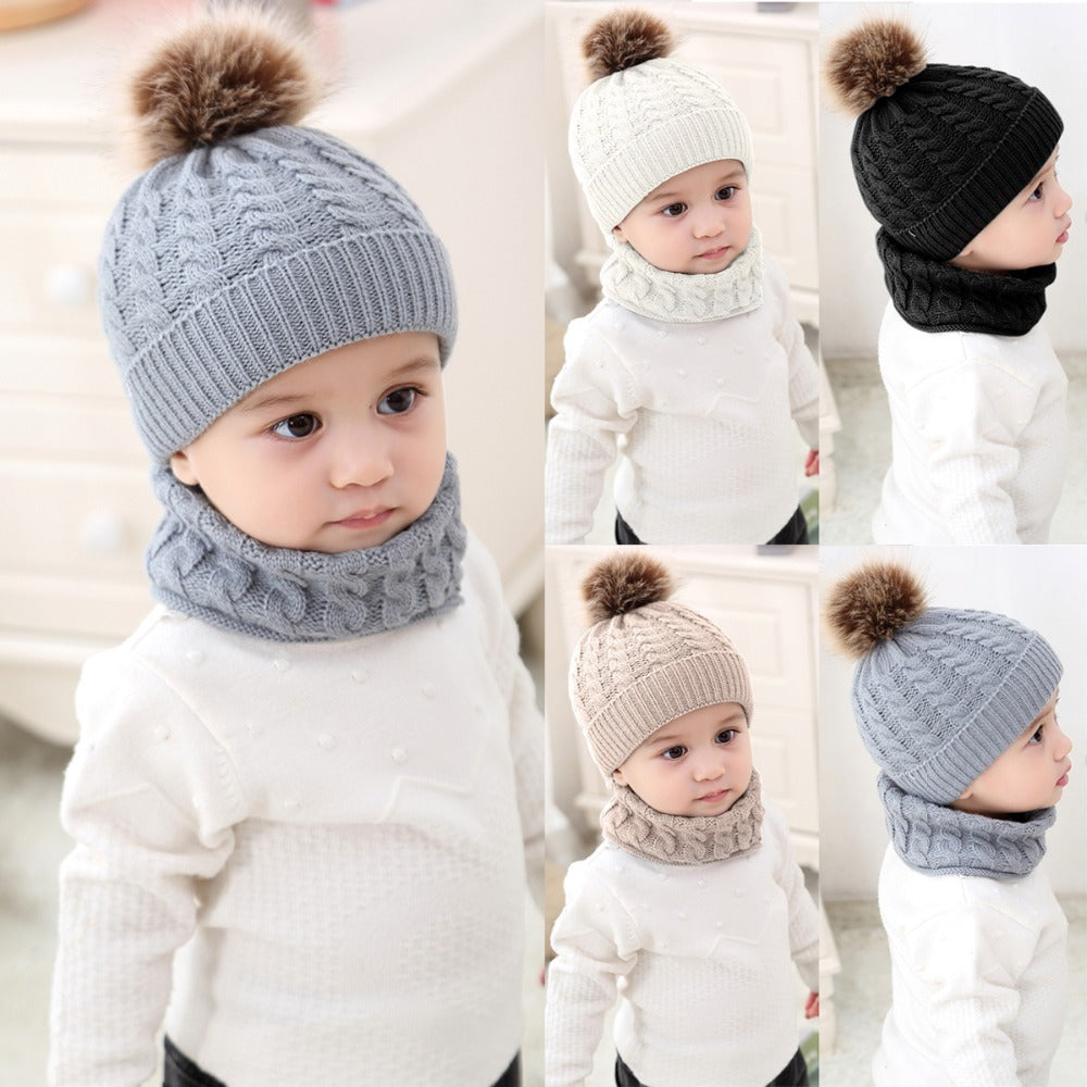 Made with 100% cotton this Baby-Toddler Cap and Scarf set will protect your little one's head, ears, and neck during the chilly fall and winter months. Perfect for boys and girls, this set is versatile for any occasion.