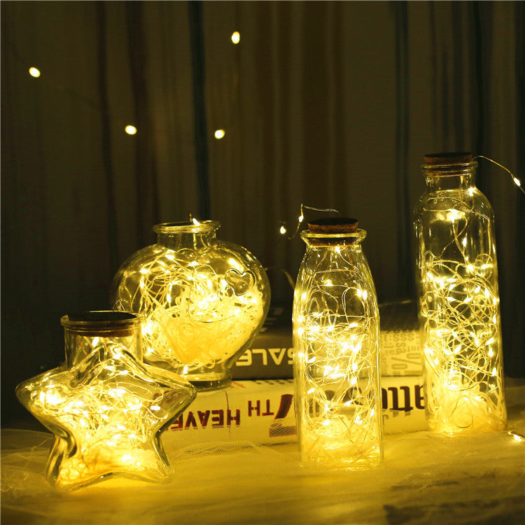 Illuminate your space with our versatile Glass bottle with gypsophila lights. Choose from 4 shapes, 3 lighting moods, soft, white, or multi colored. Mix and match to create your own unique design. Perfect for both indoor and outdoor use, this all-in-one L