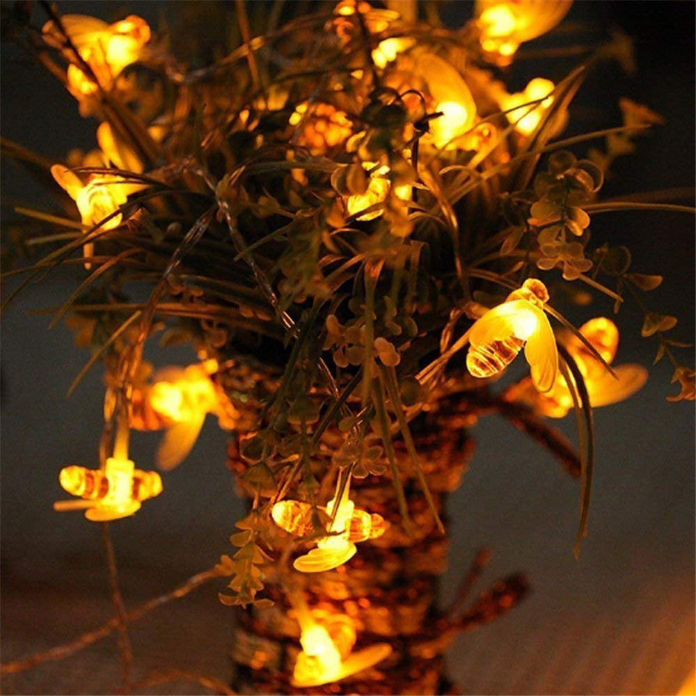 Illuminate your garden and bring warmth to your outdoor spaces with these beautiful bee solar string lights. Perfect for adding a cozy touch to your home, these lights create a festive and magical atmosphere.