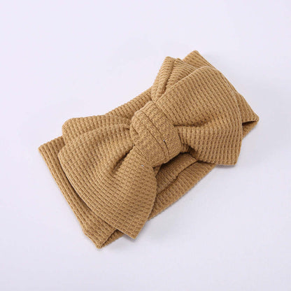 Children's Waffle Knit Oversized Bow Headband in soft brown waffle knit fabric.