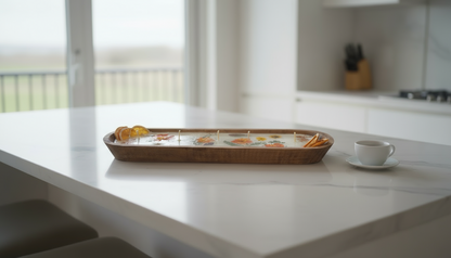 Wooden candle with fruit on a kitchen counter, blurred background