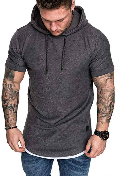 Men's Solid Color Hooded T-shirt modeled by a man with tattoos, showcasing a stylish and comfortable look.