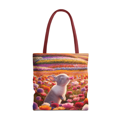 This Tote Bag features a cute design of a bunny smelling a flower in a field of flowers, giving off a whimsical and nature-loving vibe. Perfect for nature enthusiasts and animal lovers, this Tote Bag is great for everyday use for shopping, farmer's market