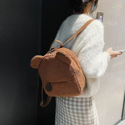 Get ready to snuggle up with this adorable Mini Backpack! Featuring a fluffy lamb design and a single strap, this cozy bag is perfect for fall and winter. Don't miss out on adding this must-have one-shoulder messenger bag to your collection! For girls & f