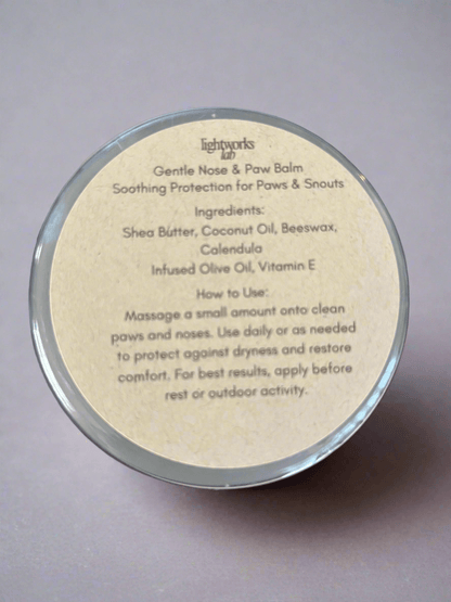 Gentle Nose & Paw Balm 4 oz. ingredients and usage instructions on packaging, soothing balm for pets.