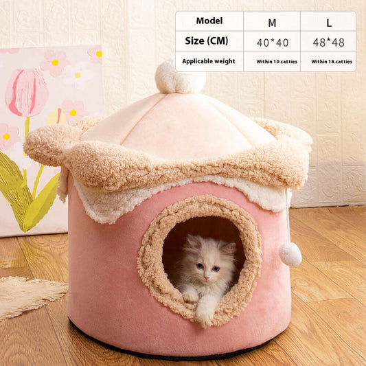 Cute kitten peeking out of an Ice Cream House Pet Bed in soft pink color, perfect for small pets.