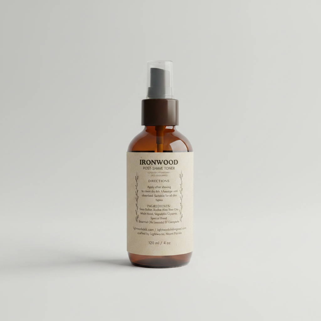 Bottle of Ironwood post-shave toner on a blurred barbershop background