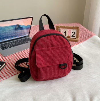 As a passionate believer in our product's value, I highly recommend this backpack for any occasion, whether it be for back to school or everyday use. The cute corduroy design adds a touch of quirkiness to your style, making you stand out with enthusiasm a