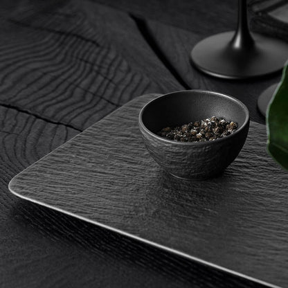 Villeroy & Boch Manufacture Rock Glow 3 Piece Condiment Set, Premium Porcelain, Made in Germany featuring a black bowl with spices.