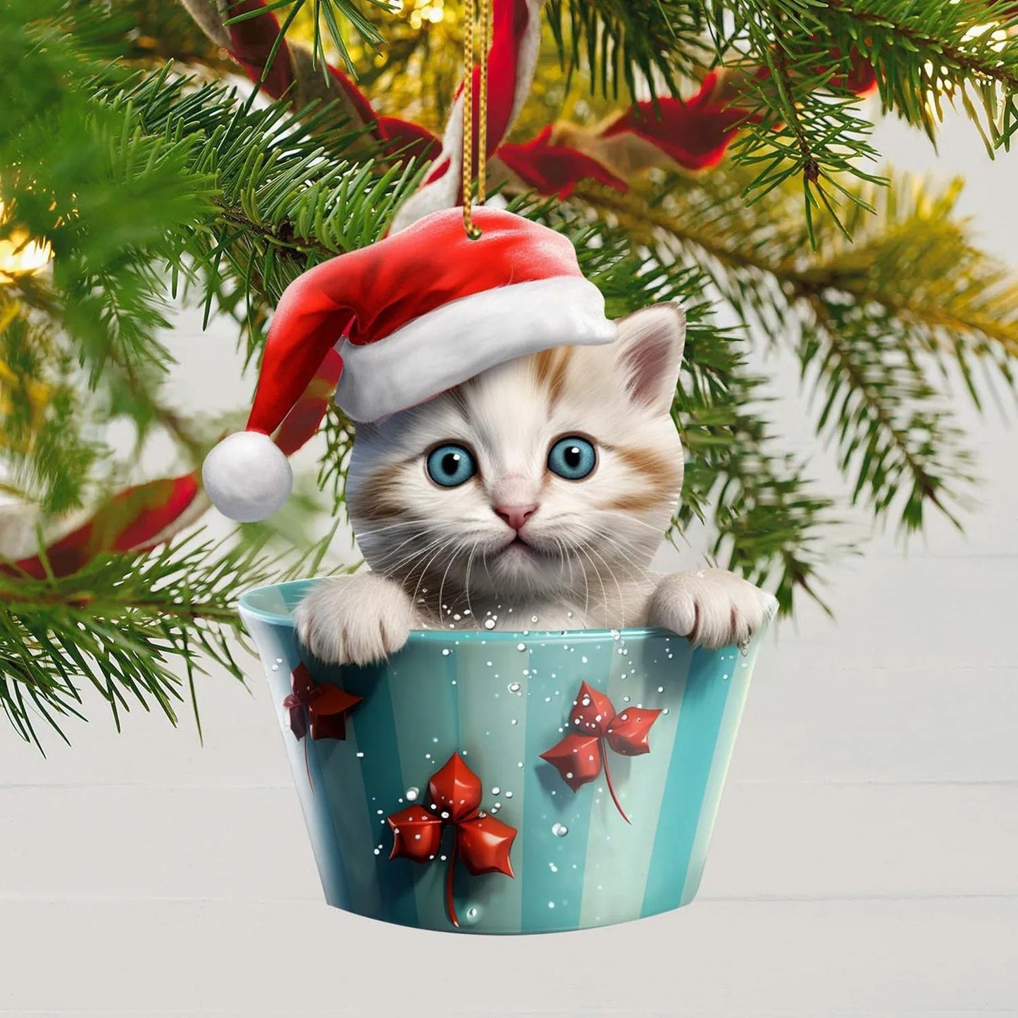 Stylish feline friends donning Santa hats, nestled in charming Christmas tea cups of rich blue or vibrant red. Featuring designs of Saint Nick's signature hat, delicate snowflakes, snowy landscapes, and beautiful poinsettias. Perfect for adorning your tre