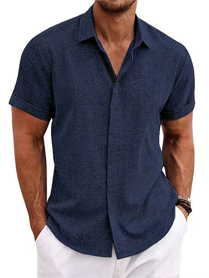 Men's linen short-sleeve t-shirt in green, relaxed fit with short sleeves and standing collar, perfect for warm weather.