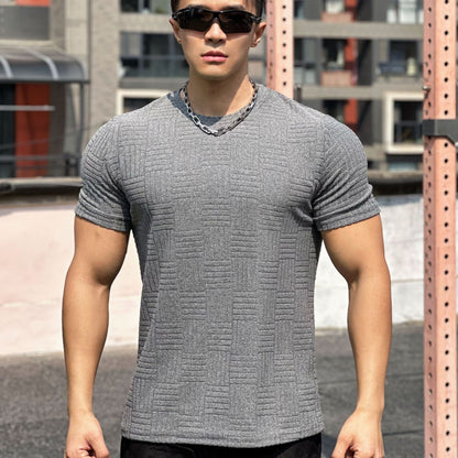 Elevate your casual wardrobe with our Men's Short Sleeve Casual Tee. Designed for versatility, this tee is perfect for any occasion - from business casual to park outings to special events. Whether you're a teen boy, young adult, or mature man, our tee is