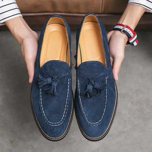 Men's casual navy suede slip-on shoes with tassels, perfect for business casual outfits.