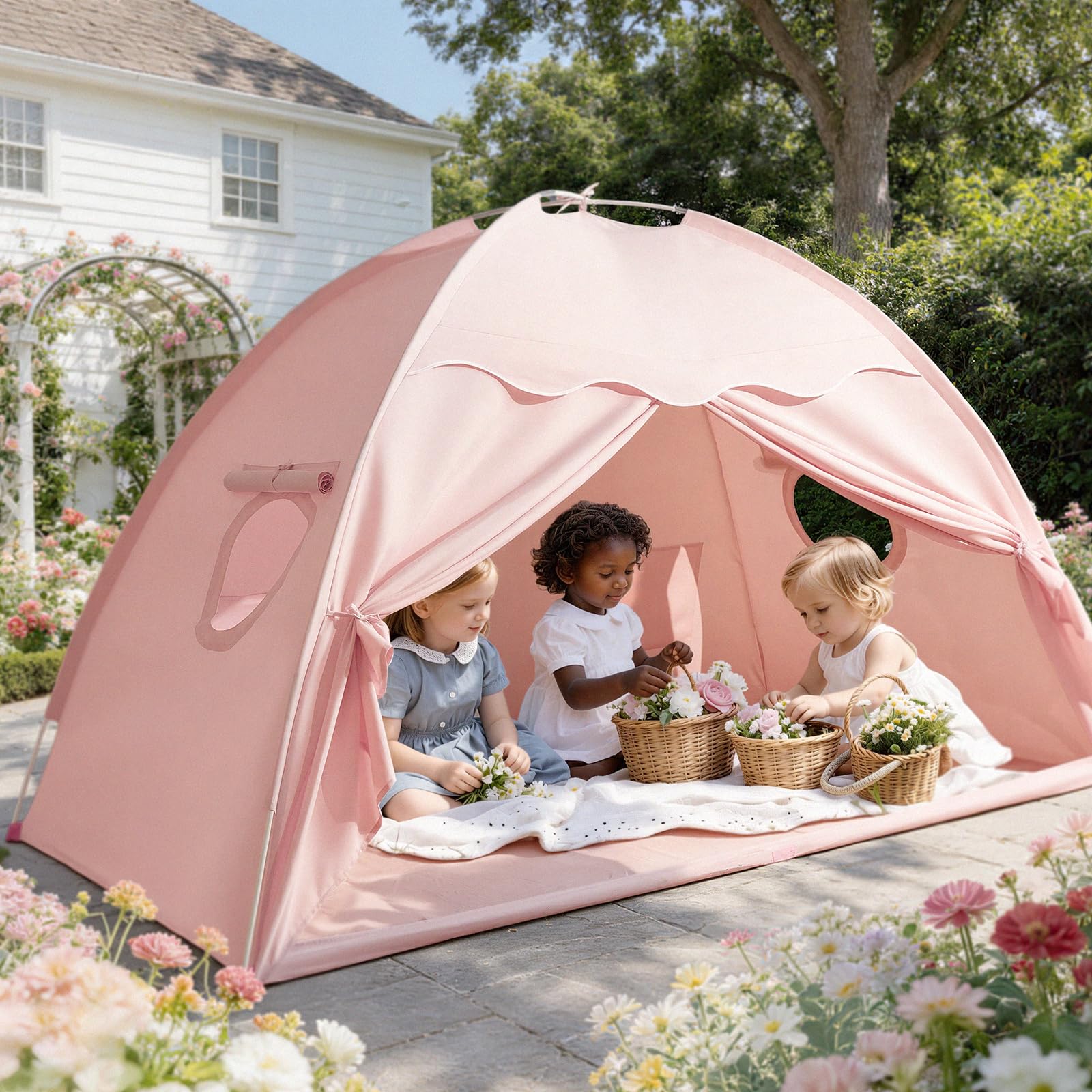 Children playing inside a pink tent in a garden setting