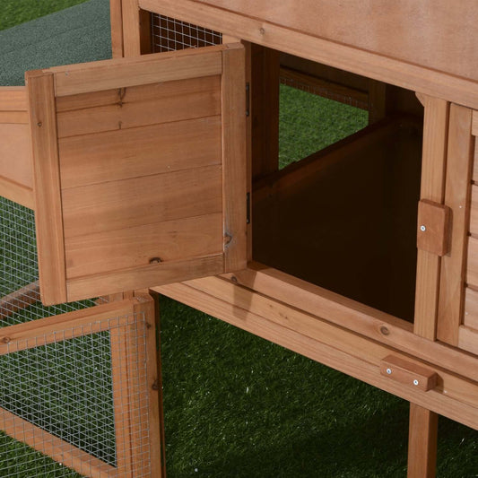 l #CommissionsEarned Pawhut Outdoor Rabbit Hutch: Spacious, weatherproof, with double runs & removable tray. It offers sturdy protection against the elements.
