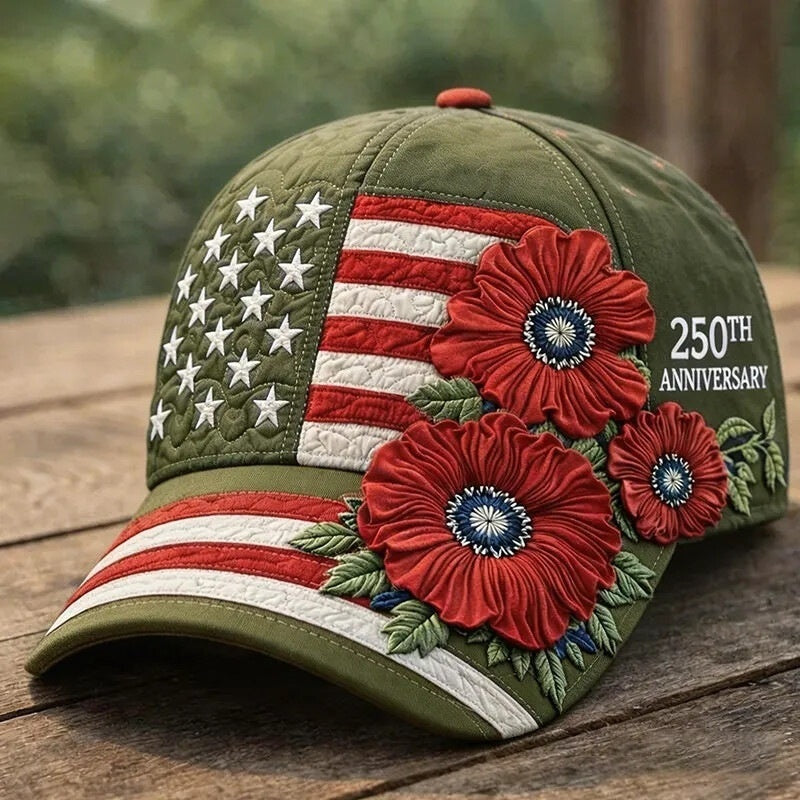 Green cap with American flag and floral design on a wooden surface