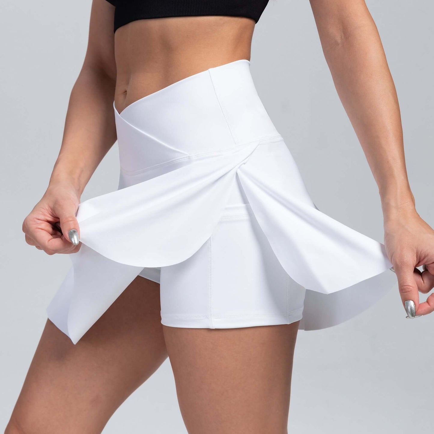 Women's Yoga Skorts featuring a stylish skirt overlay for modest coverage and comfort during active pursuits.