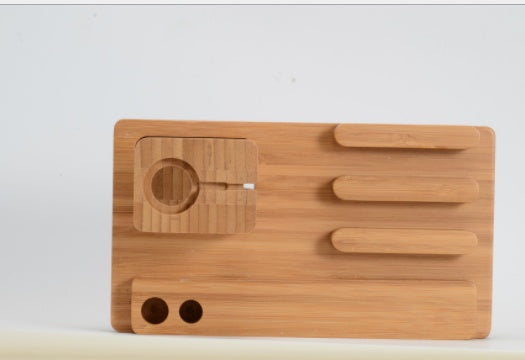 1. Made of Bamboo Wood 2. Versatile Wood Bamboo Cell Phone Tablet Stand 3. 4 USB Ports Available 4. Approximated Size: 185x110x 80mm 5. Multi-functional: Holder for iPhone 5 5s se/6 6s 7/ 6 6s 7 Plus, Charging Base for Apple Watch, Desk Stand for iPad min