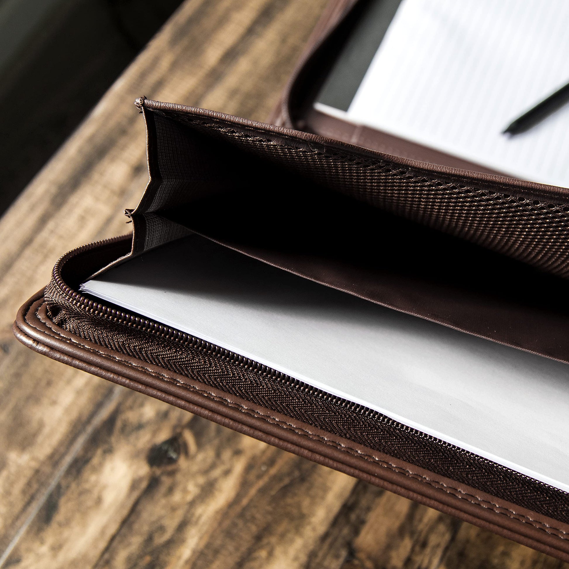 COSSINI Brown Padfolio: Superior PU leather, solar calculator, smart storage, tablet sleeve, sleek design, perfect for professionals.