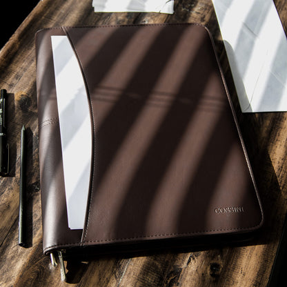 COSSINI Brown Padfolio: Superior PU leather, solar calculator, smart storage, tablet sleeve, sleek design, perfect for professionals.