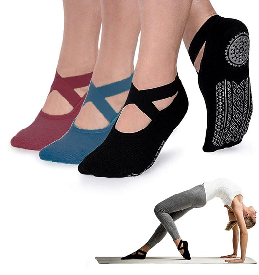 Yoga socks in various colors with a person in a yoga pose on a white background