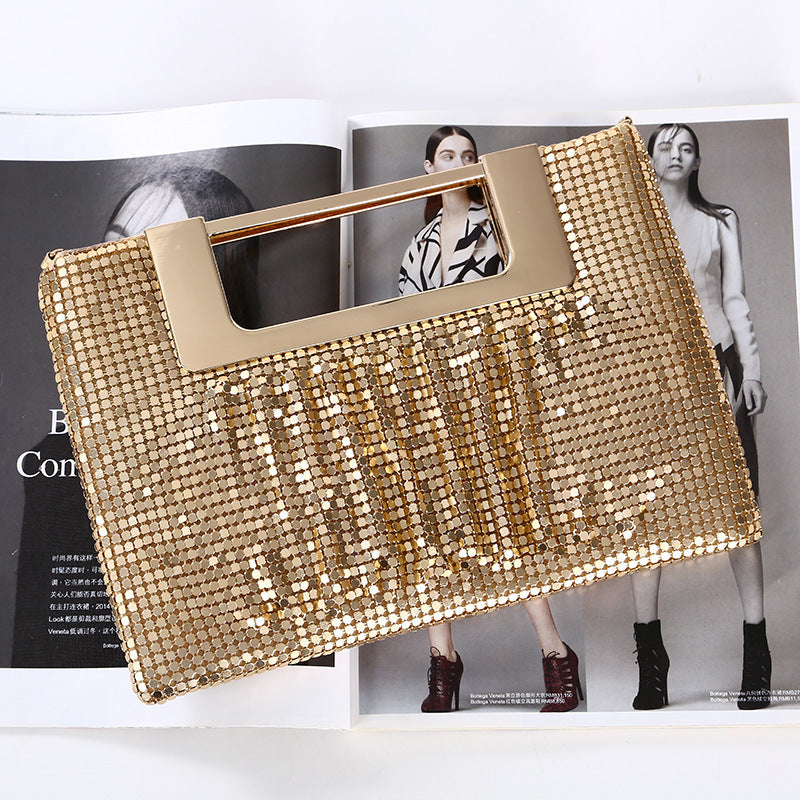 Make a statement without trying too hard. Elevate your style for any occasion - whether it's prom, dinner dates, or casual lunches, you'll be the talk of the town with this simple yet chic clutch. Specifications: length 27.5cm* width 2.5cm* height 19.5cm