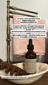 Botanica Follicle Oil bottle with a Gua Sha comb on a wooden surface.