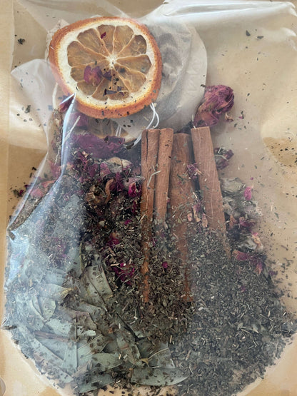 Seasonal Dry or Simmering Potpourris featuring dried herbs, spices, and citrus in a clear packaging.