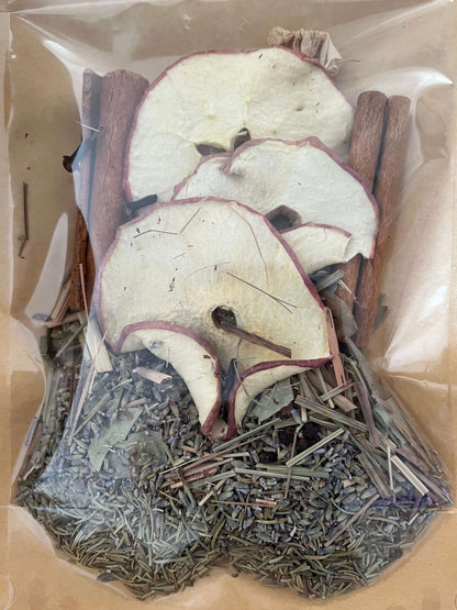 Seasonal Dry or Simmering Potpourris featuring apple slices, cinnamon sticks, and dried herbs.