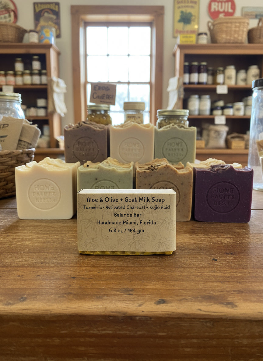 Bar of soap with a label on a textured gray surface